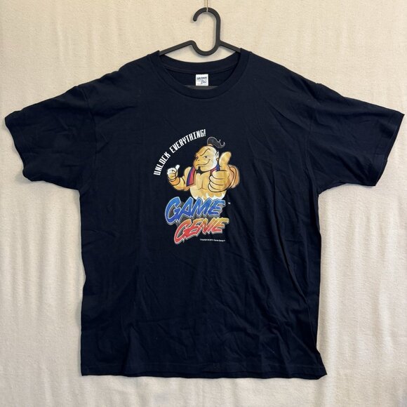 Unlock Everything! Game Genie 2012 Promo T-Shirt Nintendo Sega Playstation XL - Picture 1 of 9